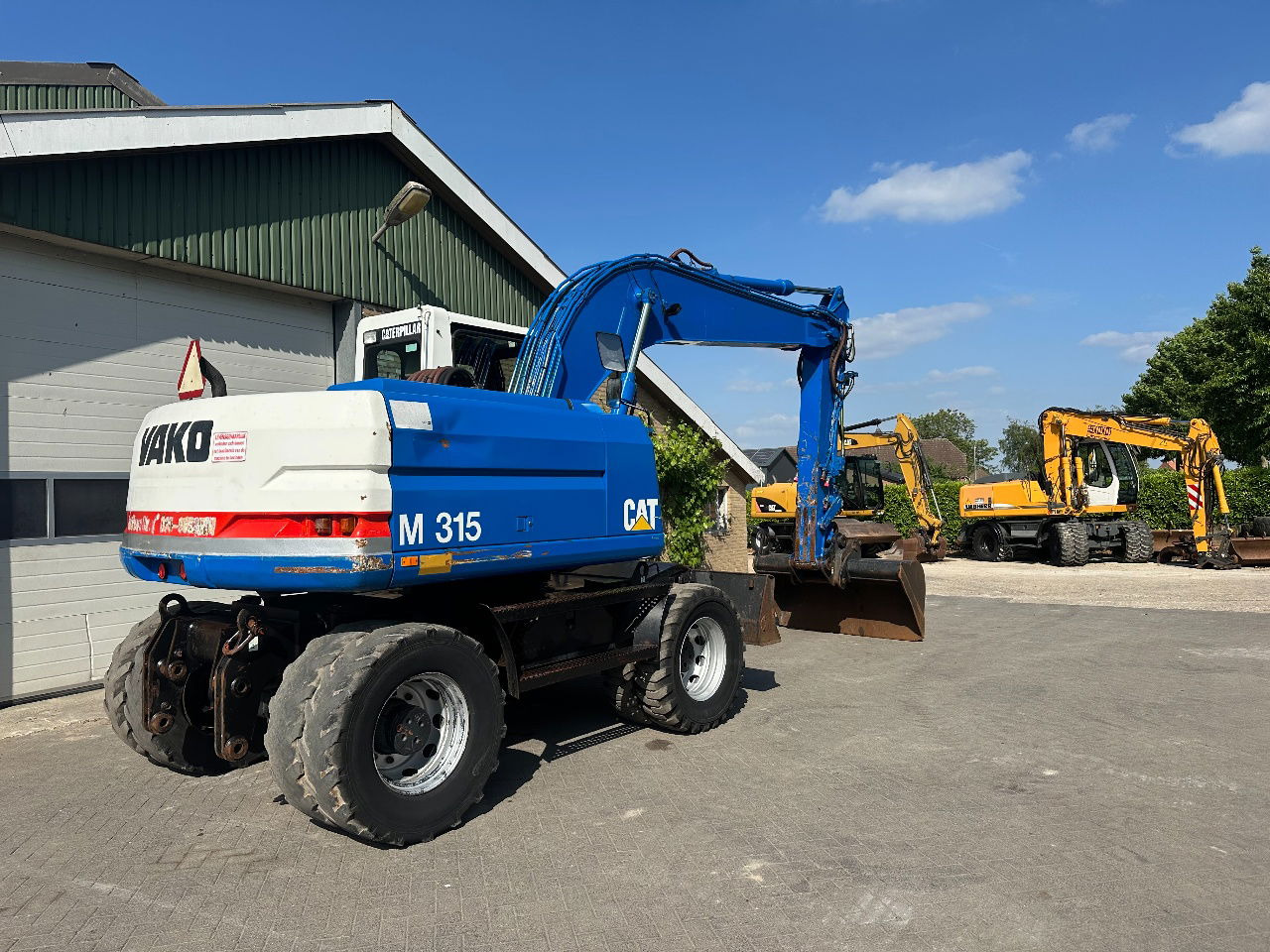 Caterpillar M315 - Τροχοφόρος εκσκαφέας: φωτογραφία 5 Caterpillar M315 - Τροχοφόρος εκσκαφέας: φωτογραφία 5