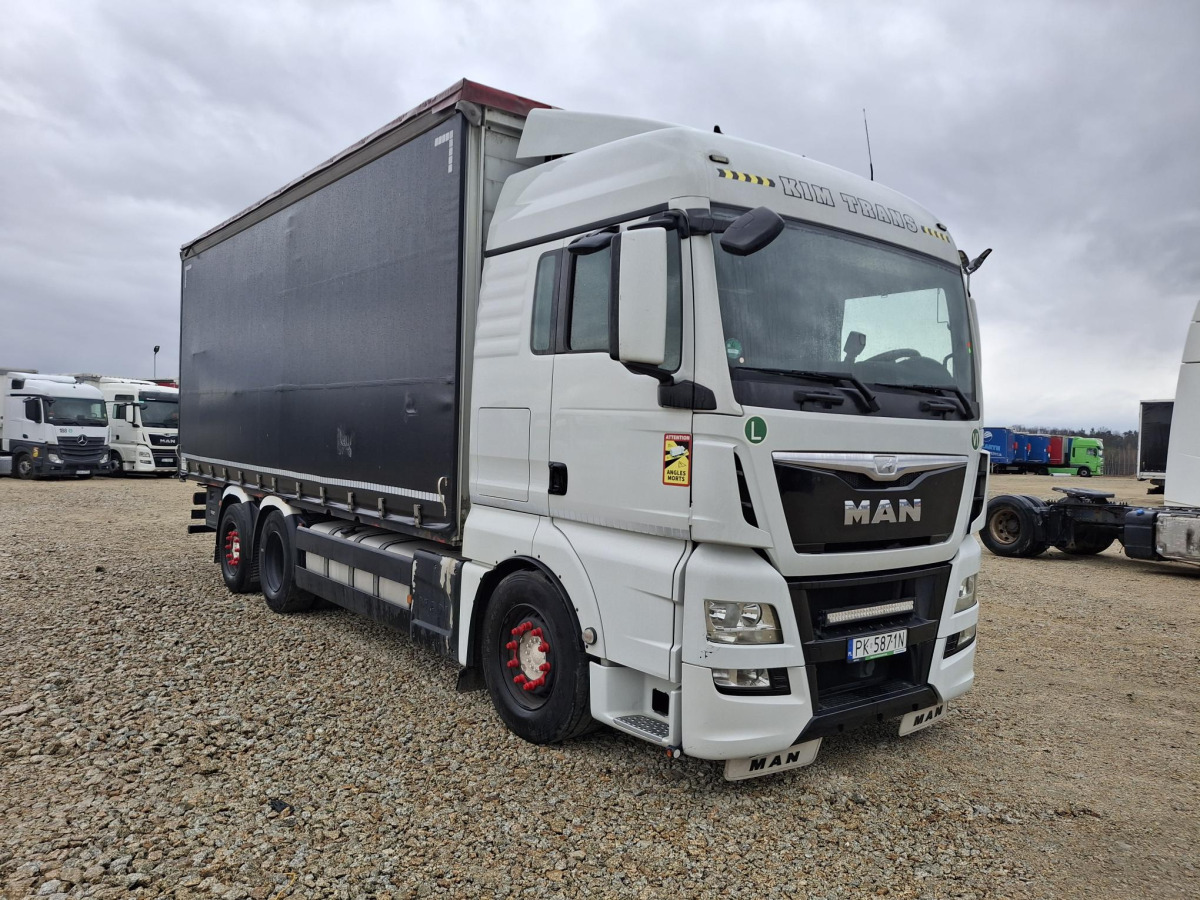 MAN TGX SOLÓWKA - Φορτηγό μουσαμάς: φωτογραφία 1 MAN TGX SOLÓWKA - Φορτηγό μουσαμάς: φωτογραφία 1