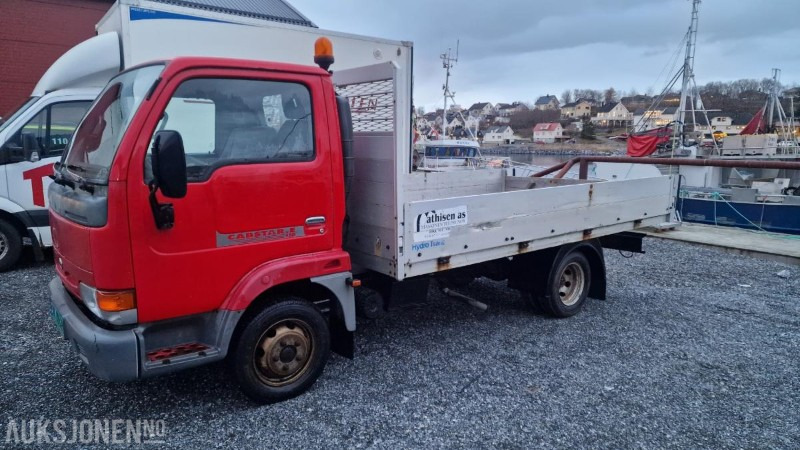 2000 Nissan CABSTAR E Planbil 3.0-110 D EURO 3 117526 km - Φορτηγό με ανοιχτή καρότσα: φωτογραφία 1 2000 Nissan CABSTAR E Planbil 3.0-110 D EURO 3 117526 km - Φορτηγό με ανοιχτή καρότσα: φωτογραφία 1