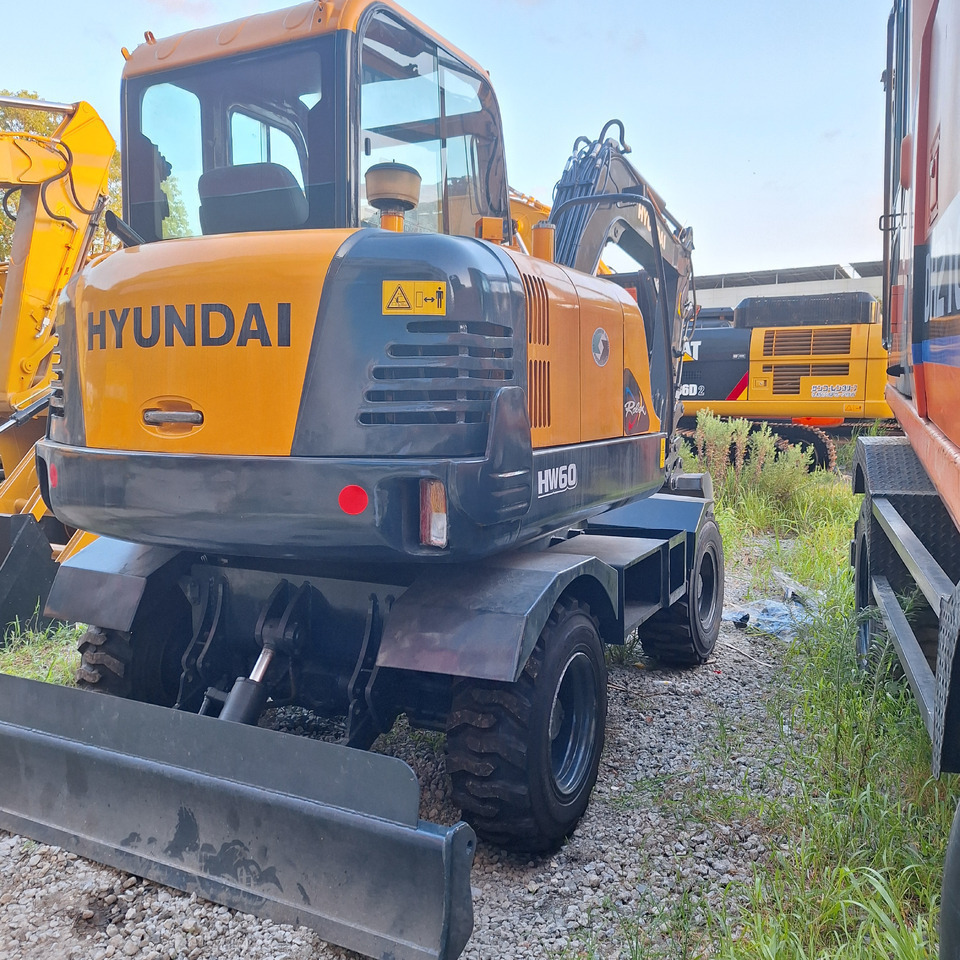 Hyundai 60vs  excavator - Τροχοφόρος εκσκαφέας: φωτογραφία 1 Hyundai 60vs  excavator - Τροχοφόρος εκσκαφέας: φωτογραφία 1