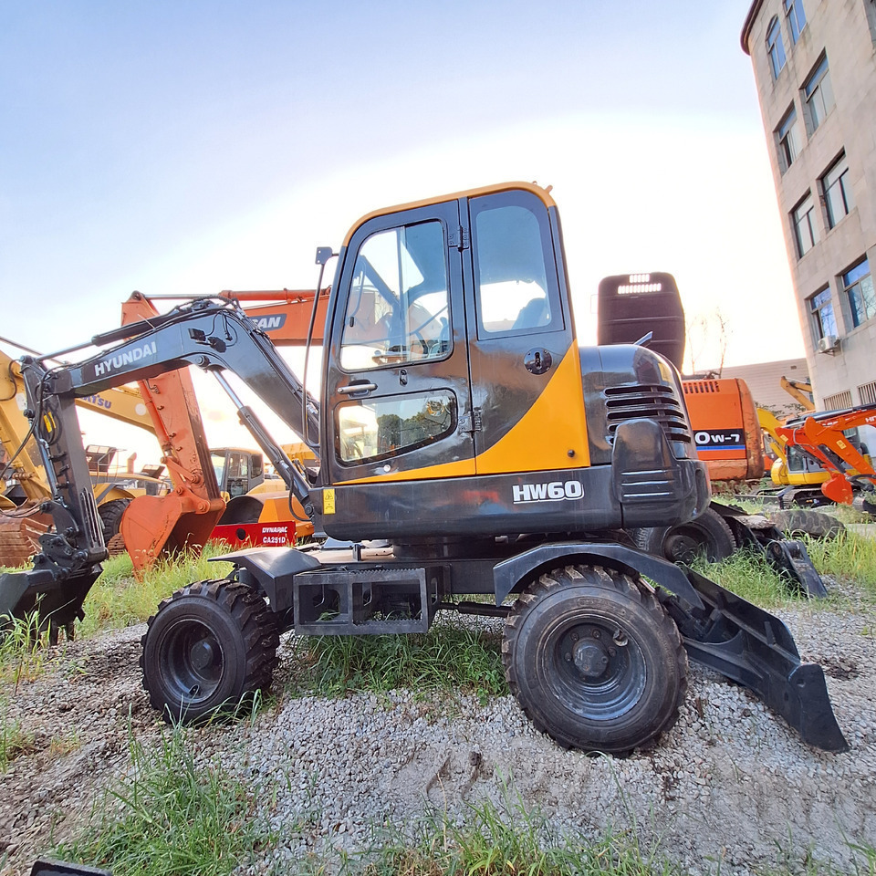 Hyundai HW60 excavator - Τροχοφόρος εκσκαφέας: φωτογραφία 5 Hyundai HW60 excavator - Τροχοφόρος εκσκαφέας: φωτογραφία 5