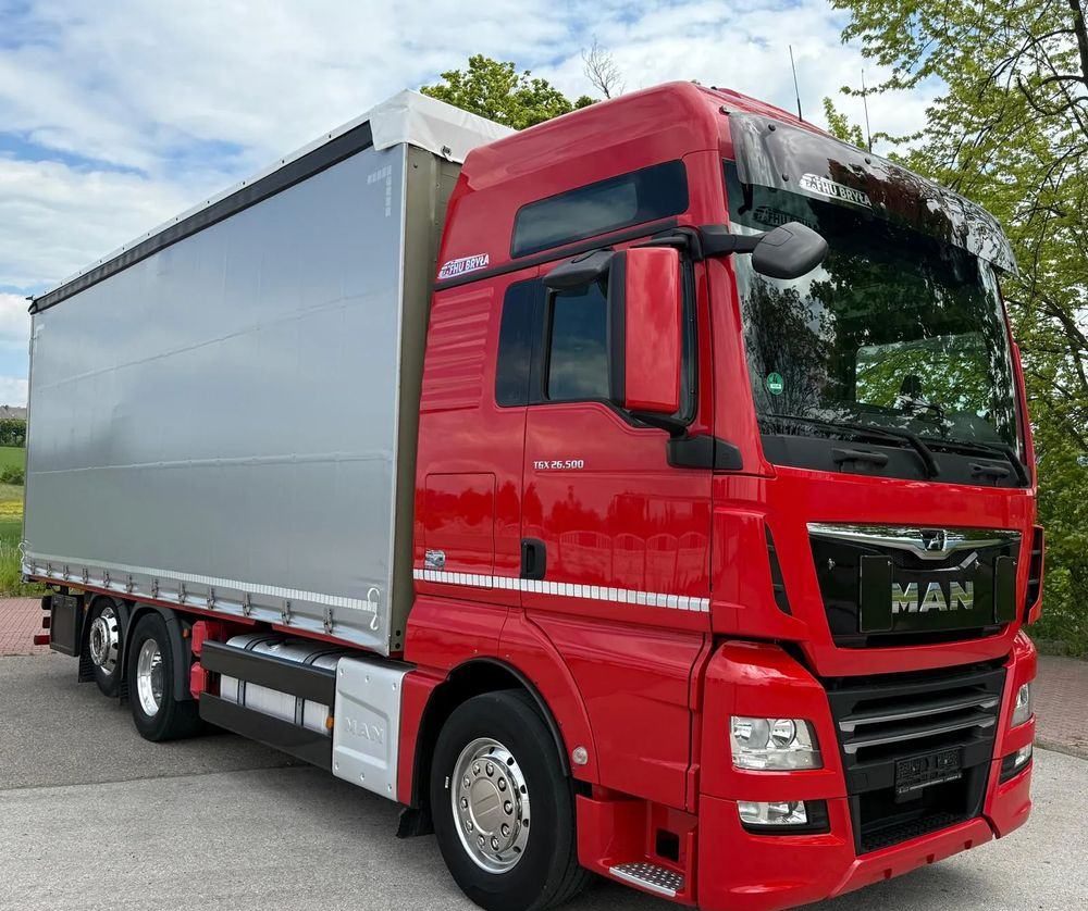 MAN TGX 26.500 / LIFT / 6X2 / KLIMA POSTOJOWA / 18PALET / E6 / FIRANKA / 18 TON ŁADOWNOŚĆ / WINDA / NISKI PRZEBIEG / JEDEN WŁAŚCICIEL / PODWIESZANA OŚ - Φορτηγό μουσαμάς: φωτογραφία 2 MAN TGX 26.500 / LIFT / 6X2 / KLIMA POSTOJOWA / 18PALET / E6 / FIRANKA / 18 TON ŁADOWNOŚĆ / WINDA / NISKI PRZEBIEG / JEDEN WŁAŚCICIEL / PODWIESZANA OŚ - Φορτηγό μουσαμάς: φωτογραφία 2