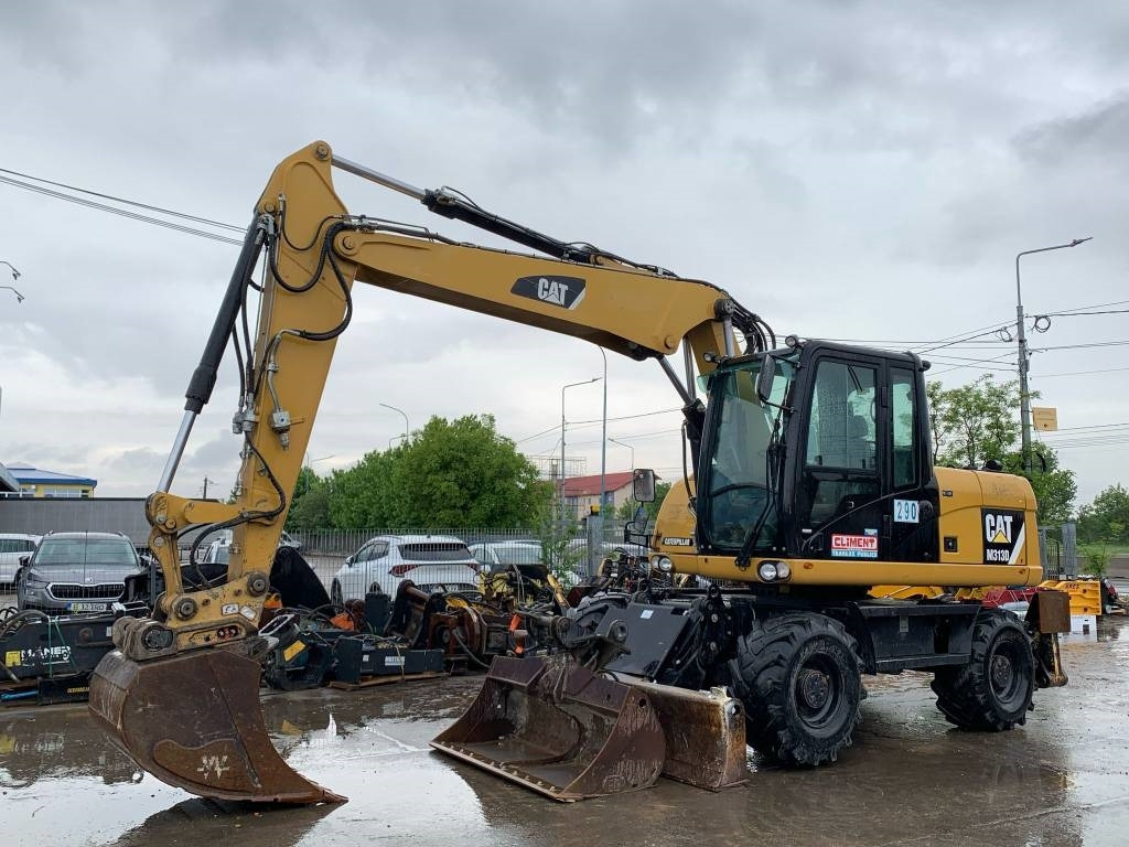 CAT M 313 D - Τροχοφόρος εκσκαφέας: φωτογραφία 1 CAT M 313 D - Τροχοφόρος εκσκαφέας: φωτογραφία 1