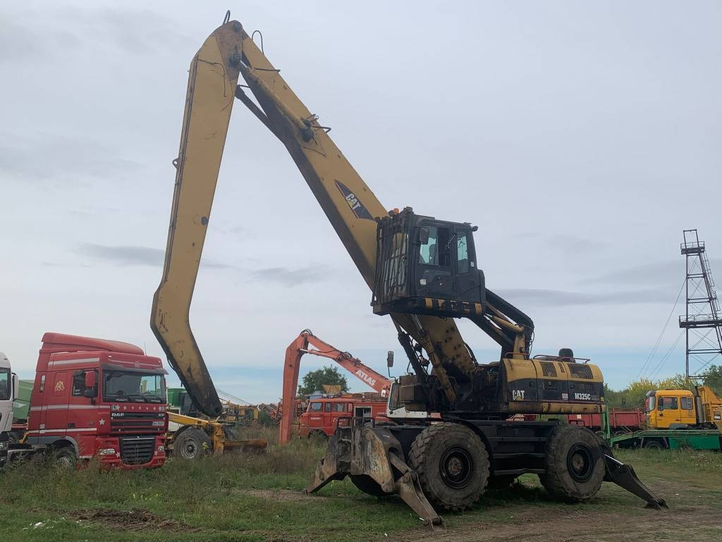 CAT M 325 C L MH - Μηχάνημα Διαχείρισης Υλικών: φωτογραφία 1 CAT M 325 C L MH - Μηχάνημα Διαχείρισης Υλικών: φωτογραφία 1