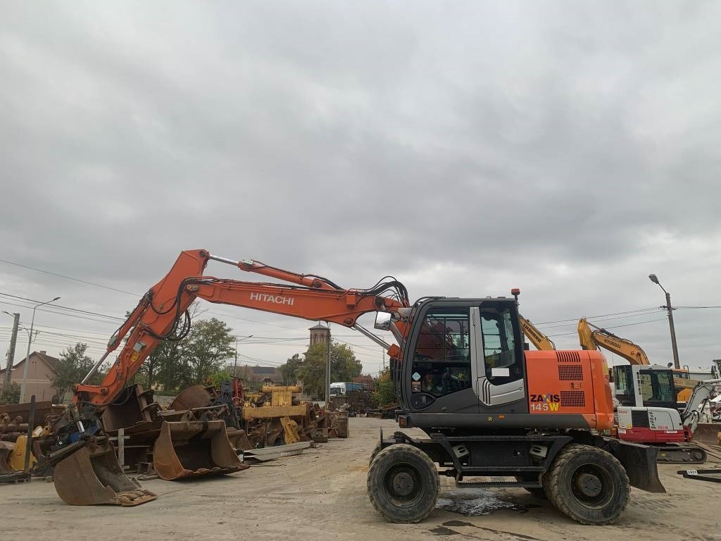 Hitachi ZX 145 W-3+SMP Rototilt  - Τροχοφόρος εκσκαφέας: φωτογραφία 2 Hitachi ZX 145 W-3+SMP Rototilt  - Τροχοφόρος εκσκαφέας: φωτογραφία 2