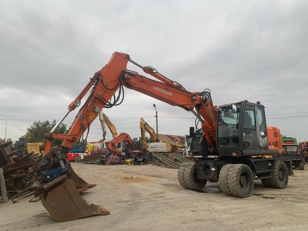 Hitachi ZX 145 W-3+SMP Rototilt  - Τροχοφόρος εκσκαφέας: φωτογραφία 1 Hitachi ZX 145 W-3+SMP Rototilt  - Τροχοφόρος εκσκαφέας: φωτογραφία 1