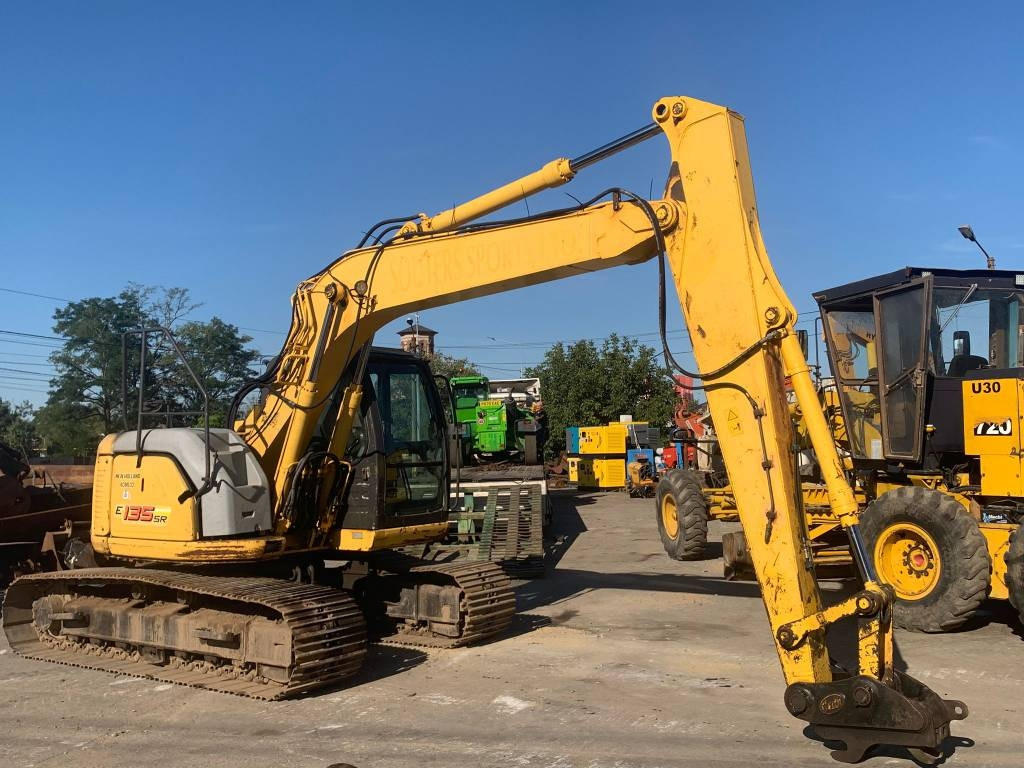 New Holland E 135 SR - Ερπυστριοφόρος εκσκαφέας: φωτογραφία 1 New Holland E 135 SR - Ερπυστριοφόρος εκσκαφέας: φωτογραφία 1