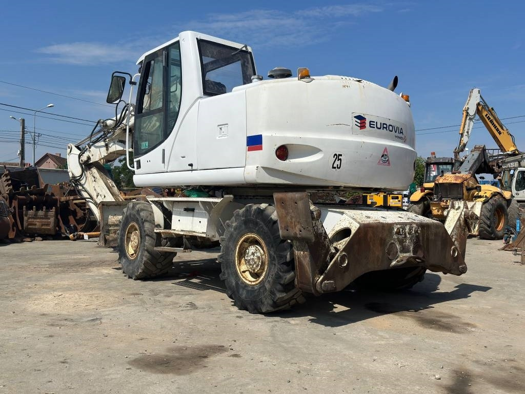 New Holland MH Plus - Τροχοφόρος εκσκαφέας: φωτογραφία 5 New Holland MH Plus - Τροχοφόρος εκσκαφέας: φωτογραφία 5