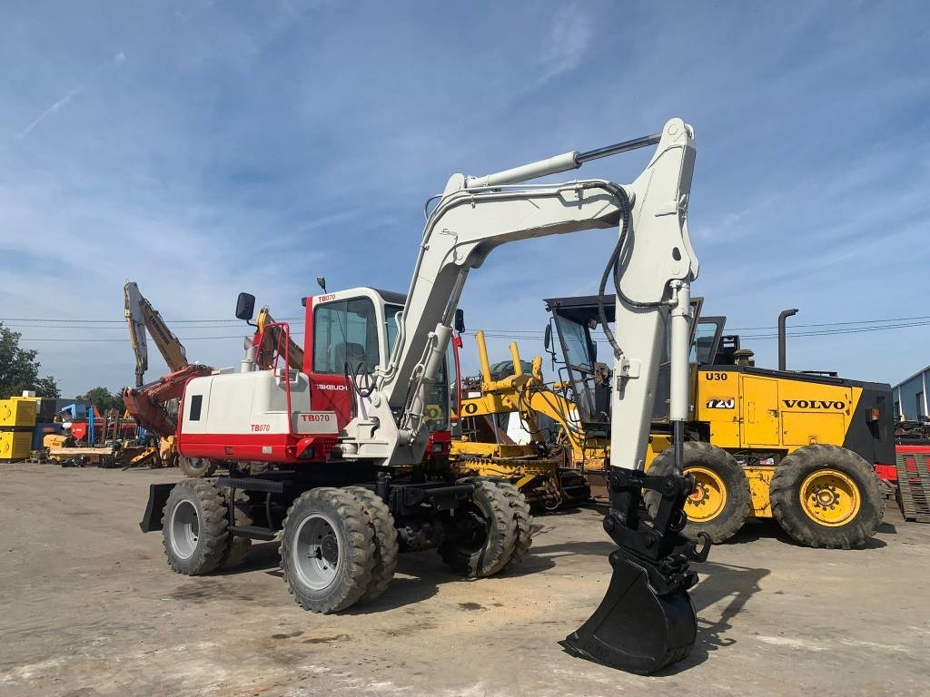 Takeuchi TB070W - Τροχοφόρος εκσκαφέας: φωτογραφία 2 Takeuchi TB070W - Τροχοφόρος εκσκαφέας: φωτογραφία 2