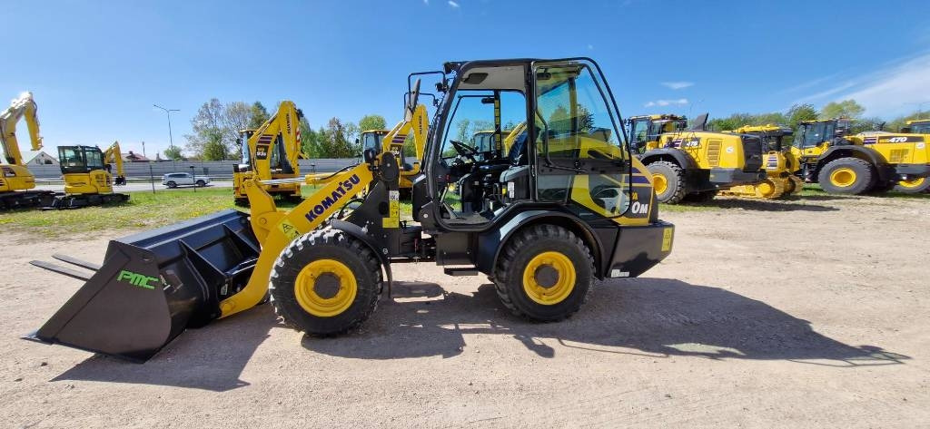 Komatsu WA 70 - Ελαστιχοφόρος φορτωτής: φωτογραφία 1 Komatsu WA 70 - Ελαστιχοφόρος φορτωτής: φωτογραφία 1
