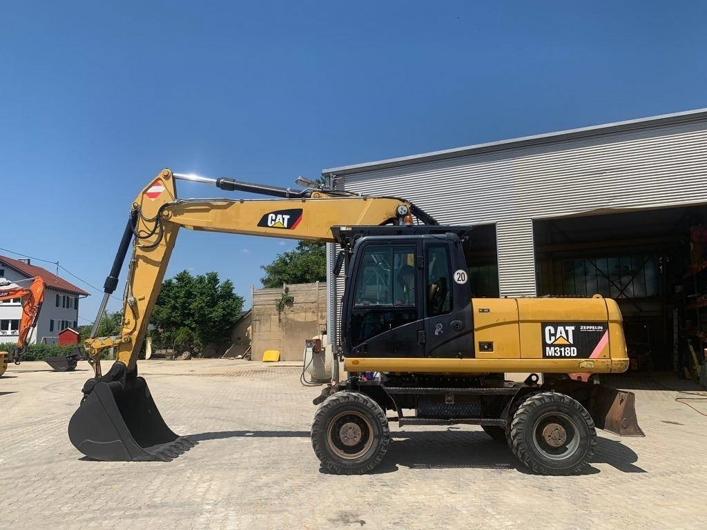 CAT M 318 D - Τροχοφόρος εκσκαφέας: φωτογραφία 2 CAT M 318 D - Τροχοφόρος εκσκαφέας: φωτογραφία 2