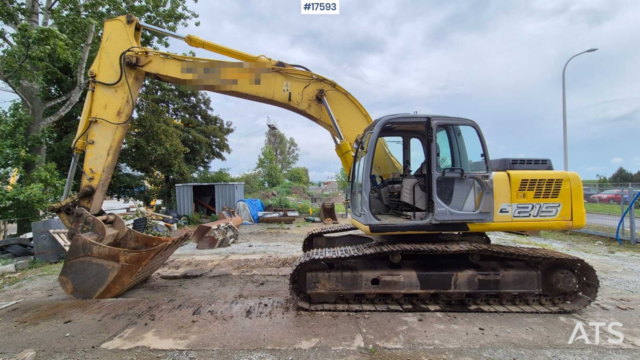 2005 New Holland E215 - Ερπυστριοφόρος εκσκαφέας: φωτογραφία 1 2005 New Holland E215 - Ερπυστριοφόρος εκσκαφέας: φωτογραφία 1