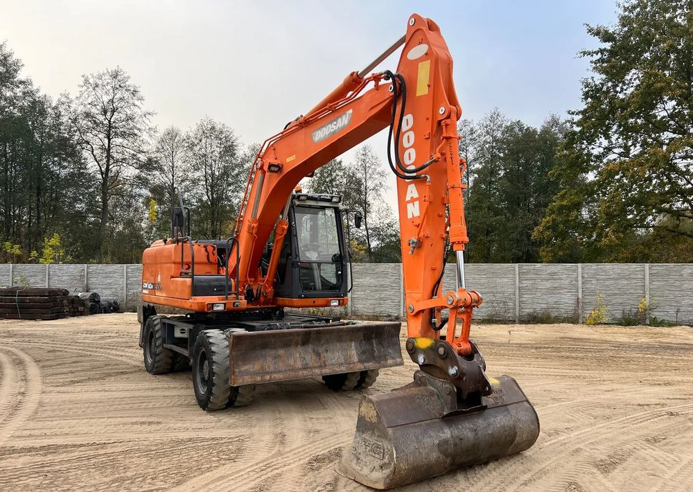 Doosan DX140W-3 - Τροχοφόρος εκσκαφέας: φωτογραφία 2 Doosan DX140W-3 - Τροχοφόρος εκσκαφέας: φωτογραφία 2