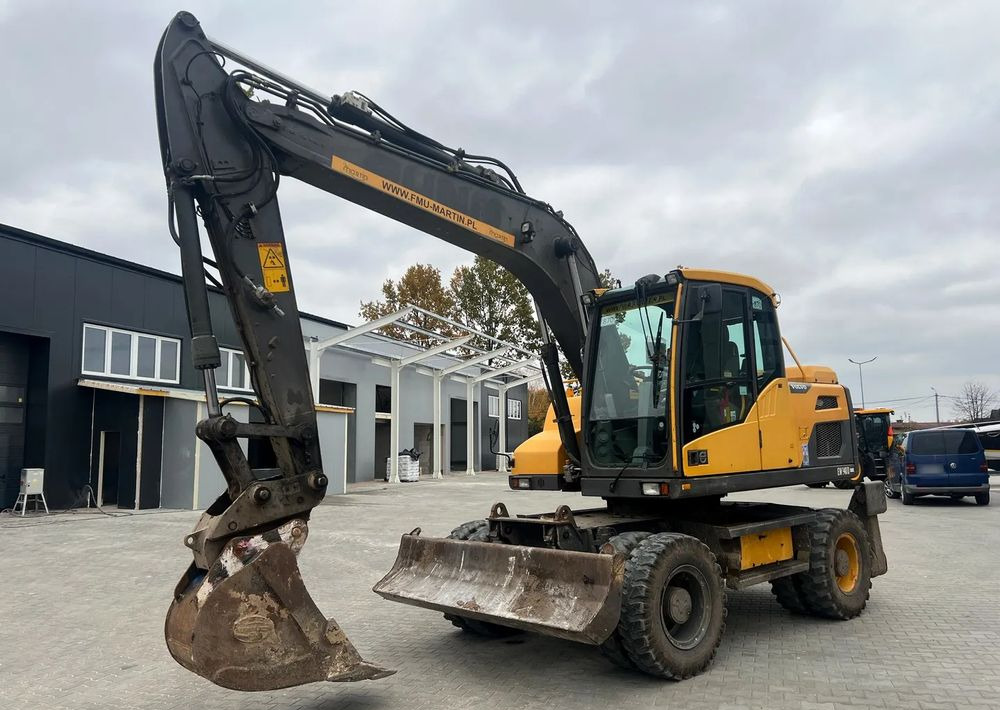 Volvo EW140D - Τροχοφόρος εκσκαφέας: φωτογραφία 2 Volvo EW140D - Τροχοφόρος εκσκαφέας: φωτογραφία 2