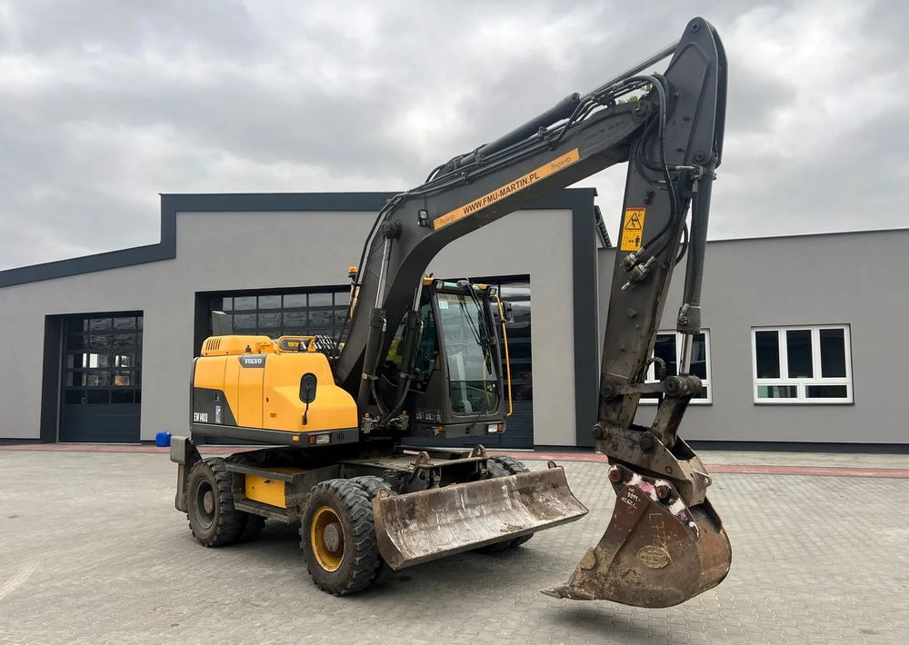 Volvo EW140D - Τροχοφόρος εκσκαφέας: φωτογραφία 1 Volvo EW140D - Τροχοφόρος εκσκαφέας: φωτογραφία 1