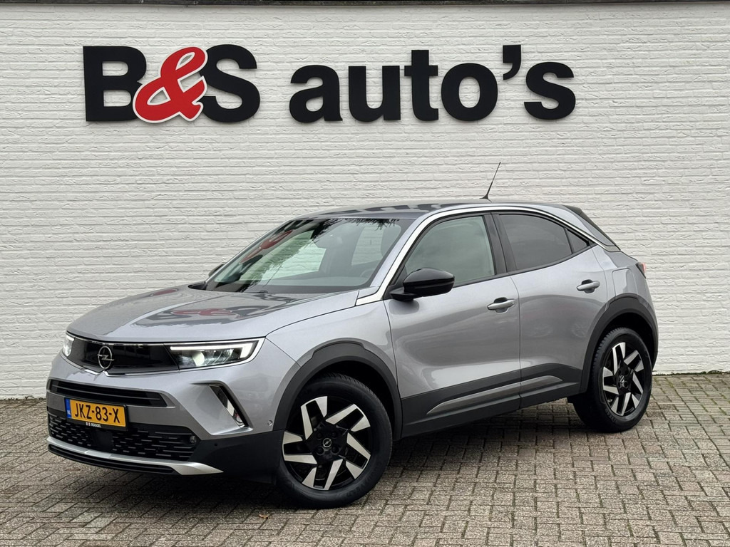 Opel Mokka-1.2 Turbo Elegance Cruise control Climate control Stoel- stuurverwarming Apple / Android Parkeersensoren plus camera - SUV: φωτογραφία 1 Opel Mokka-1.2 Turbo Elegance Cruise control Climate control Stoel- stuurverwarming Apple / Android Parkeersensoren plus camera - SUV: φωτογραφία 1