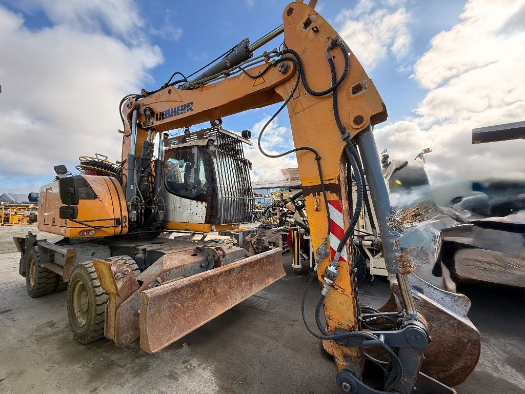 Liebherr LH 26 M Litronic - Τροχοφόρος εκσκαφέας: φωτογραφία 2 Liebherr LH 26 M Litronic - Τροχοφόρος εκσκαφέας: φωτογραφία 2
