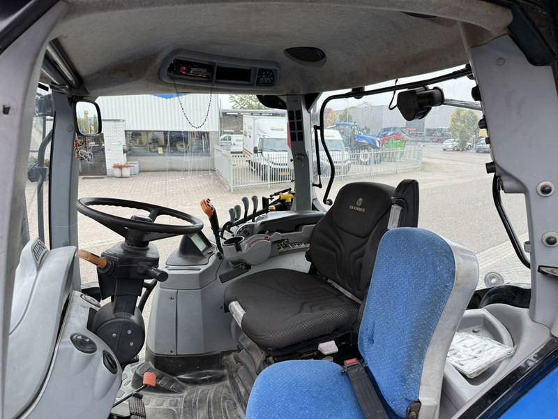 New Holland T7050 Power Command - Τρακτέρ: φωτογραφία 5 New Holland T7050 Power Command - Τρακτέρ: φωτογραφία 5