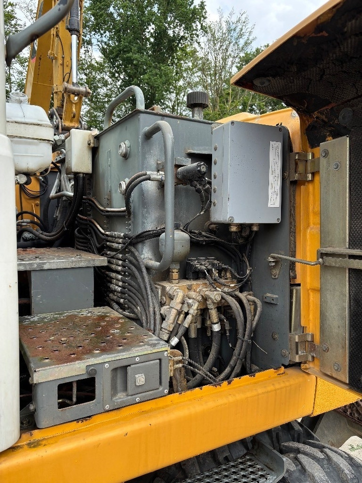 Τροχοφόρος εκσκαφέας Liebherr A316: φωτογραφία 14