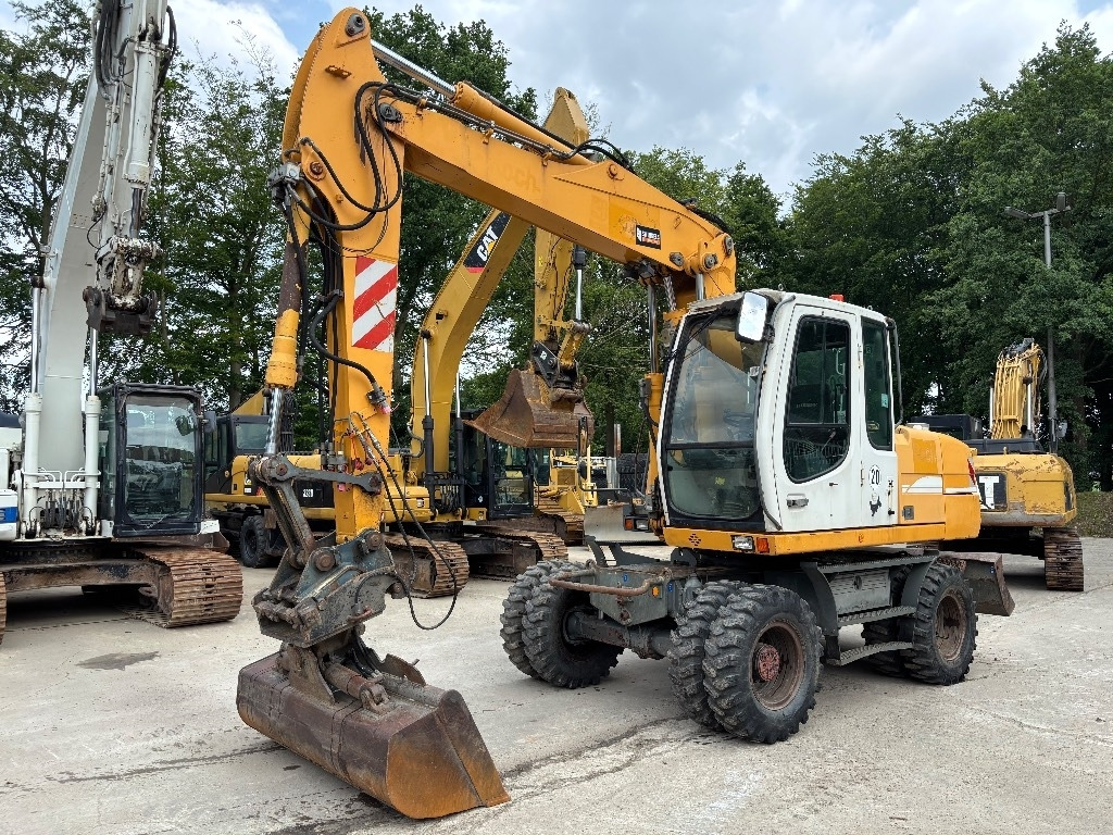 Liebherr A316 - Τροχοφόρος εκσκαφέας: φωτογραφία 1 Liebherr A316 - Τροχοφόρος εκσκαφέας: φωτογραφία 1