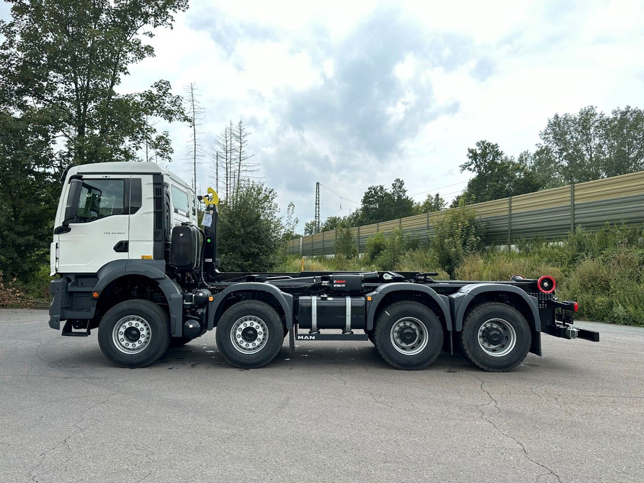 MAN TGS 35.520 8x4 Euro6e MultiLift 25s59 - Φορτηγό φόρτωσης γάντζου: φωτογραφία 3 MAN TGS 35.520 8x4 Euro6e MultiLift 25s59 - Φορτηγό φόρτωσης γάντζου: φωτογραφία 3