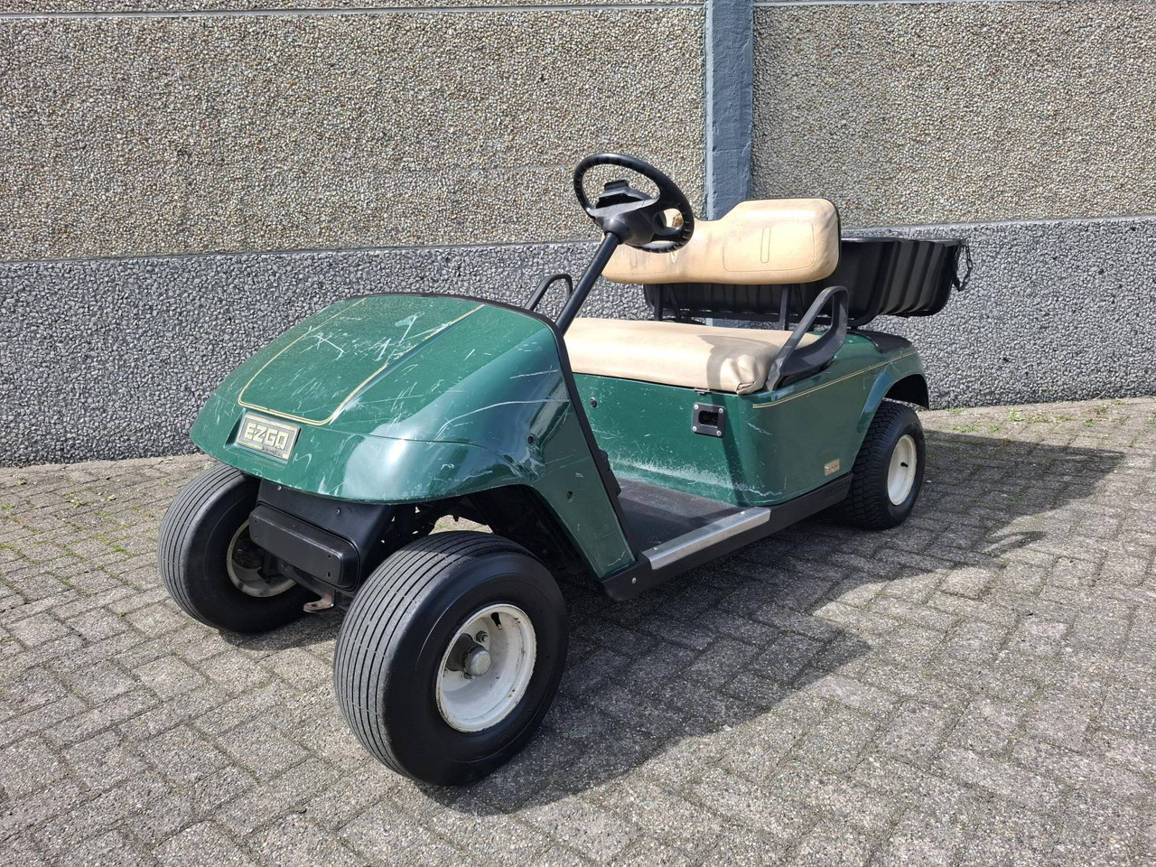 E-Z-GO TXT 2-Persoons Elektrische Golfkar met Open Laadbak 1442482 - Αμαξίδιo του γκολφ: φωτογραφία 1 E-Z-GO TXT 2-Persoons Elektrische Golfkar met Open Laadbak 1442482 - Αμαξίδιo του γκολφ: φωτογραφία 1