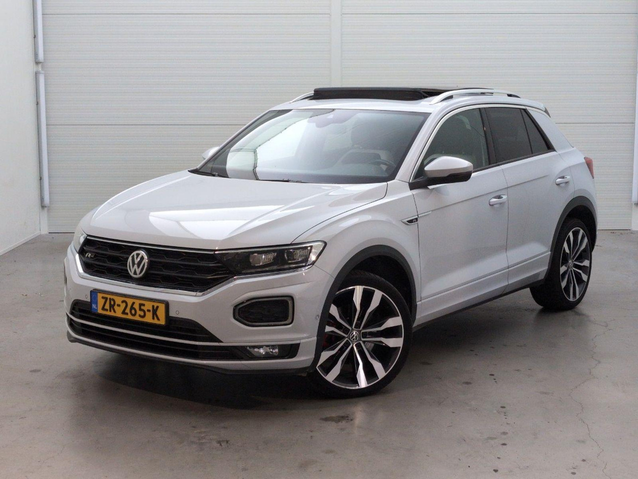 Volkswagen T-Roc 1.5 TSI Sport Business R | 2019 | 121.700 km | Automaat | ZR265K | NAP: Logisch - SUV: φωτογραφία 1 Volkswagen T-Roc 1.5 TSI Sport Business R | 2019 | 121.700 km | Automaat | ZR265K | NAP: Logisch - SUV: φωτογραφία 1