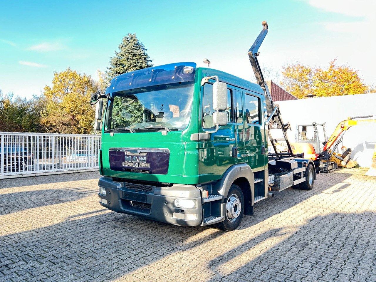 MAN 12.250 Doppelkabine Abroller - Φορτηγό φόρτωσης γάντζου: φωτογραφία 1 MAN 12.250 Doppelkabine Abroller - Φορτηγό φόρτωσης γάντζου: φωτογραφία 1