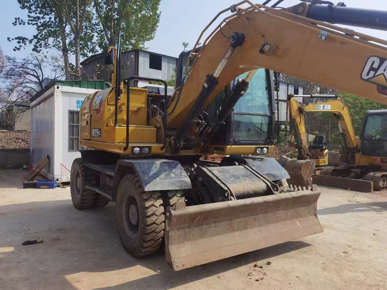 CATERPILLAR M315GC - Τροχοφόρος εκσκαφέας: φωτογραφία 3 CATERPILLAR M315GC - Τροχοφόρος εκσκαφέας: φωτογραφία 3
