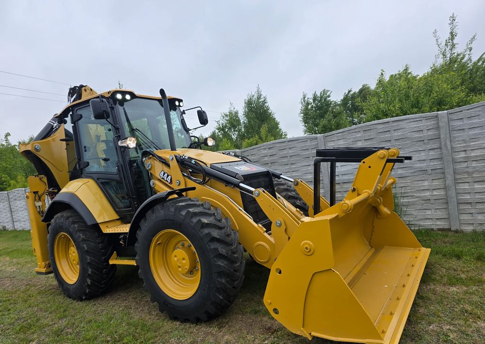 Caterpillar - Φορτωτής εκσκαφέας: φωτογραφία 1 Caterpillar - Φορτωτής εκσκαφέας: φωτογραφία 1