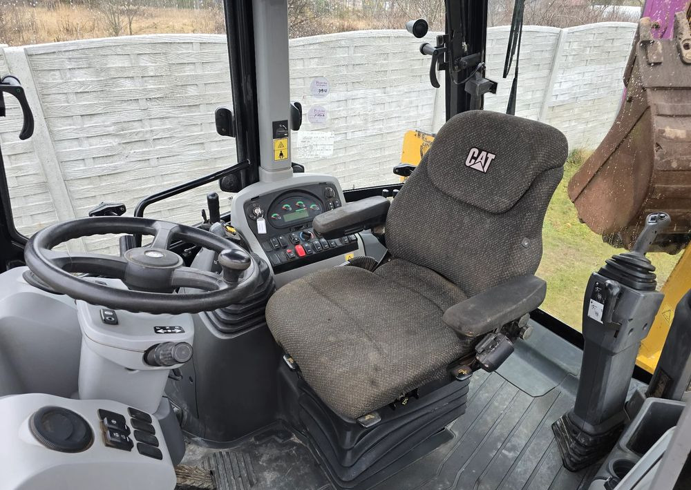 Caterpillar - Φορτωτής εκσκαφέας: φωτογραφία 3 Caterpillar - Φορτωτής εκσκαφέας: φωτογραφία 3