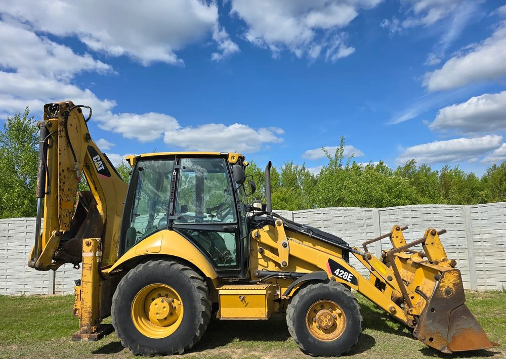 Caterpillar - Φορτωτής εκσκαφέας: φωτογραφία 5 Caterpillar - Φορτωτής εκσκαφέας: φωτογραφία 5