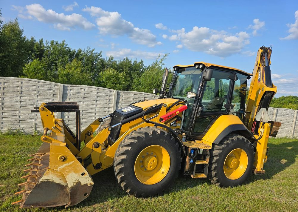 Caterpillar - Φορτωτής εκσκαφέας: φωτογραφία 3 Caterpillar - Φορτωτής εκσκαφέας: φωτογραφία 3