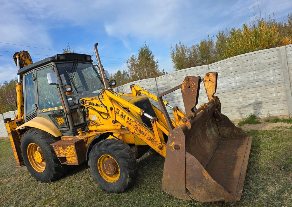JCB - Φορτωτής εκσκαφέας: φωτογραφία 1 JCB - Φορτωτής εκσκαφέας: φωτογραφία 1