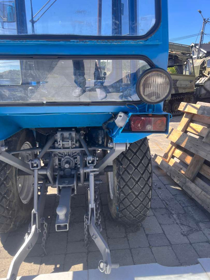 Iseki TX1500 brøyteskjær og feiekost - Τρακτέρ: φωτογραφία 2 Iseki TX1500 brøyteskjær og feiekost - Τρακτέρ: φωτογραφία 2