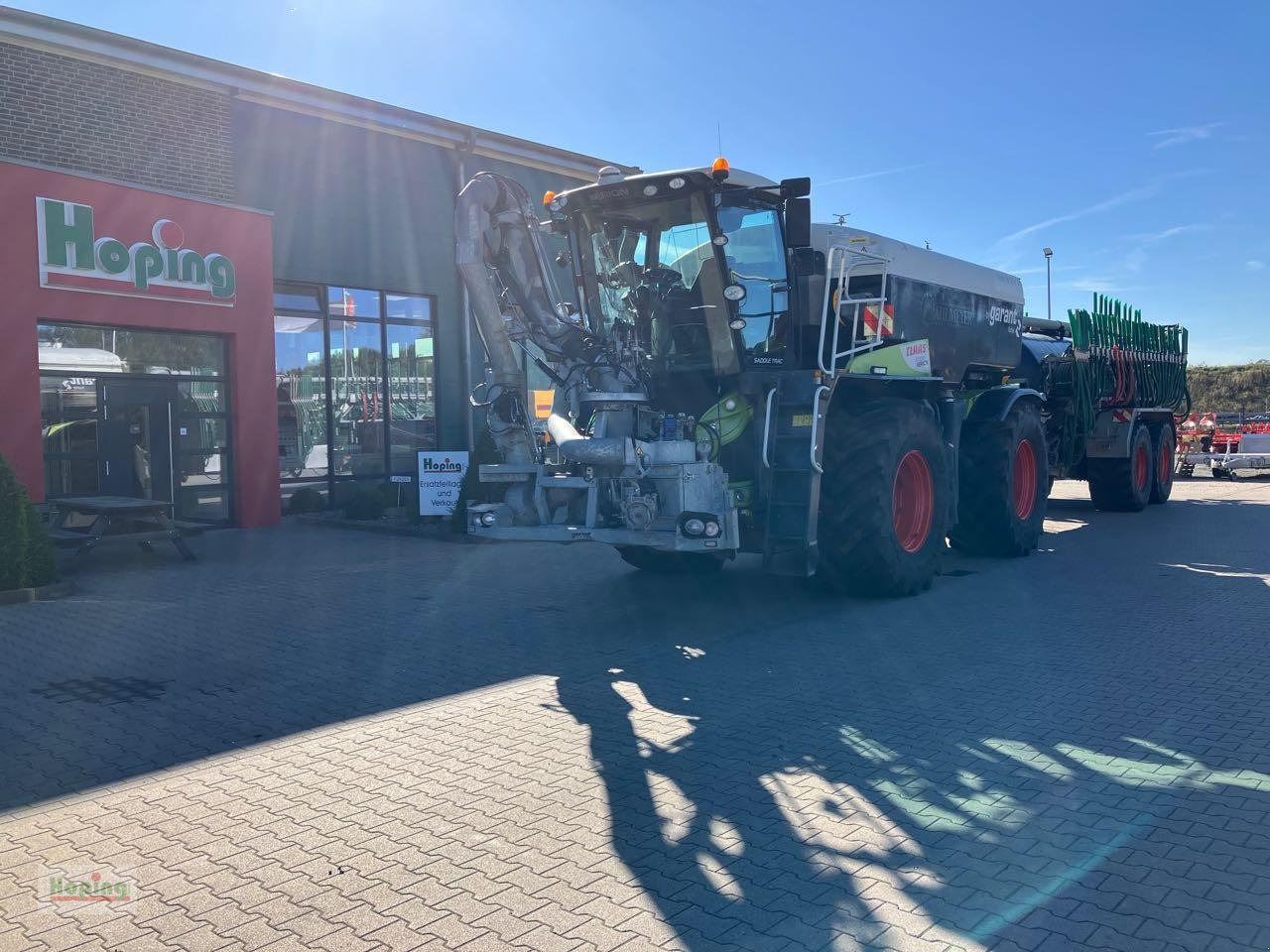 CLAAS Xerion 4000 Saddle Trac Gülletechnik - Τρακτέρ: φωτογραφία 1 CLAAS Xerion 4000 Saddle Trac Gülletechnik - Τρακτέρ: φωτογραφία 1