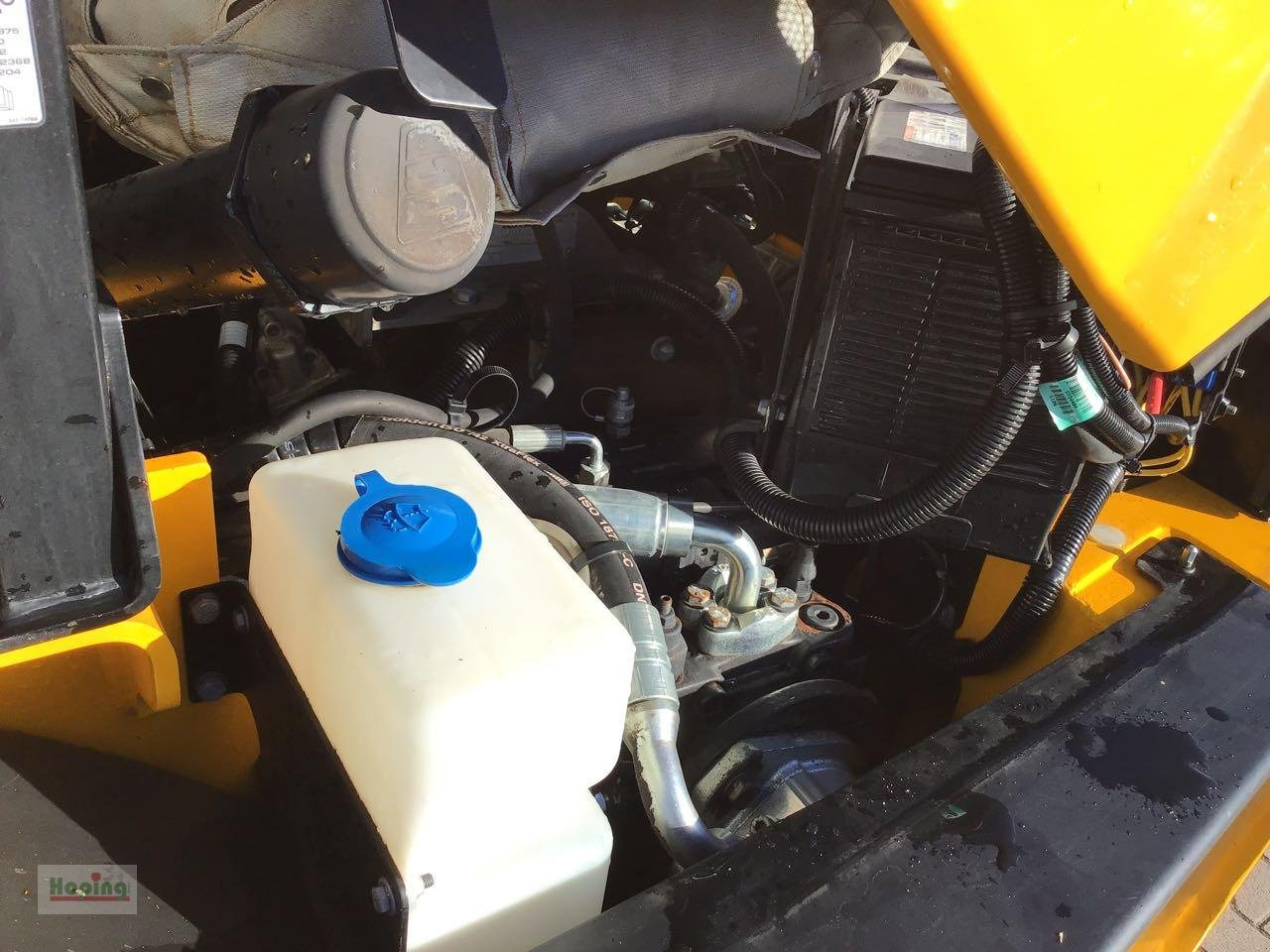 Ελαστιχοφόρος φορτωτής JCB 409: φωτογραφία 11