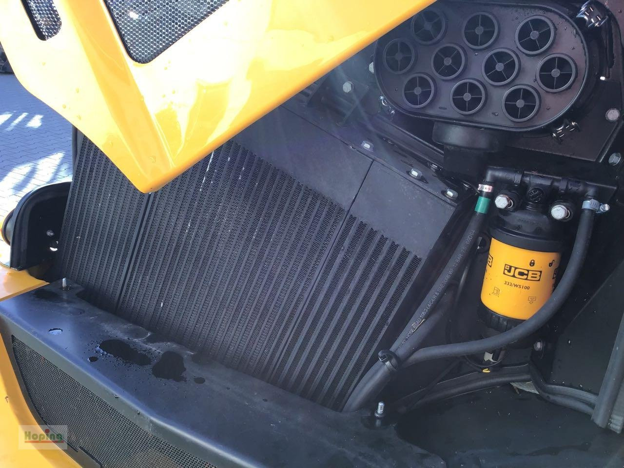 Ελαστιχοφόρος φορτωτής JCB 409: φωτογραφία 12