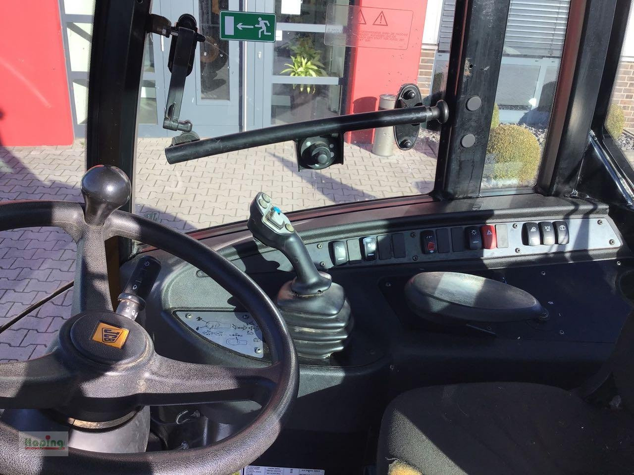 Ελαστιχοφόρος φορτωτής JCB 409: φωτογραφία 9