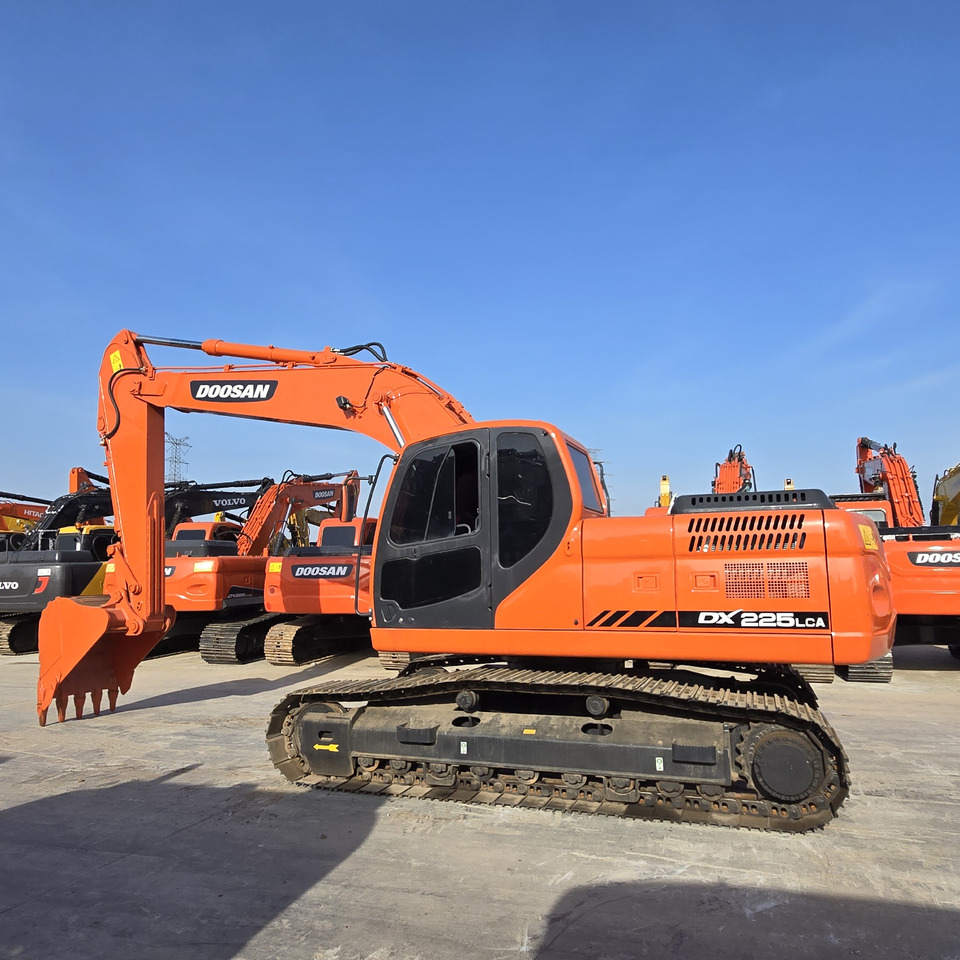 DOOSAN DX225LCA - Ερπυστριοφόρος εκσκαφέας: φωτογραφία 1 DOOSAN DX225LCA - Ερπυστριοφόρος εκσκαφέας: φωτογραφία 1