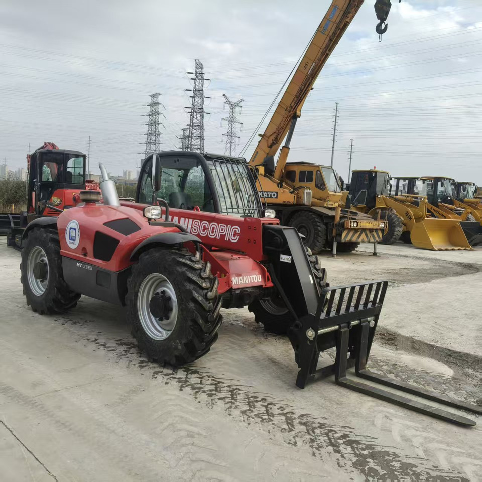 MANITOU MT-X732 - Τηλεσκοπικός φορτωτής: φωτογραφία 2 MANITOU MT-X732 - Τηλεσκοπικός φορτωτής: φωτογραφία 2