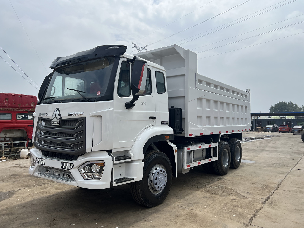 SINOTRUK HOWO - Φορτηγό ανατρεπόμενο: φωτογραφία 2 SINOTRUK HOWO - Φορτηγό ανατρεπόμενο: φωτογραφία 2