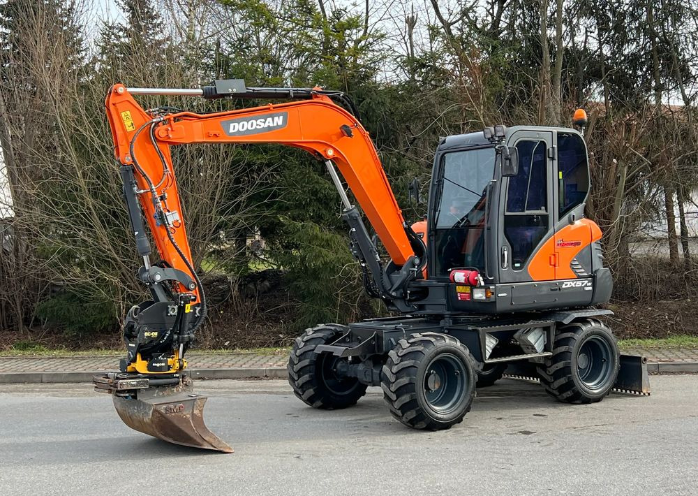 Doosan DOOSAN DX57W *ROTOTILT* 2200 Motogodzin * Jak Nowa * Sprowadzona * Stan Perfekcyjny - Τροχοφόρος εκσκαφέας: φωτογραφία 1 Doosan DOOSAN DX57W *ROTOTILT* 2200 Motogodzin * Jak Nowa * Sprowadzona * Stan Perfekcyjny - Τροχοφόρος εκσκαφέας: φωτογραφία 1