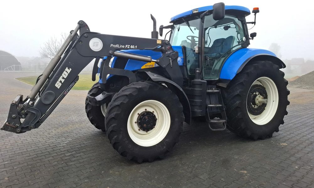 New Holland T7050 2011 Rok 9400 mtg, AutoCommand, Ładowacz czołowy Stoll, Nie Malowany, Stan Idelany - Τρακτέρ: φωτογραφία 1 New Holland T7050 2011 Rok 9400 mtg, AutoCommand, Ładowacz czołowy Stoll, Nie Malowany, Stan Idelany - Τρακτέρ: φωτογραφία 1