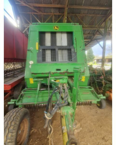 JOHN DEERE 592 - Χορτοδετική μηχανή στρόγγυλης μπάλας: φωτογραφία 1 JOHN DEERE 592 - Χορτοδετική μηχανή στρόγγυλης μπάλας: φωτογραφία 1