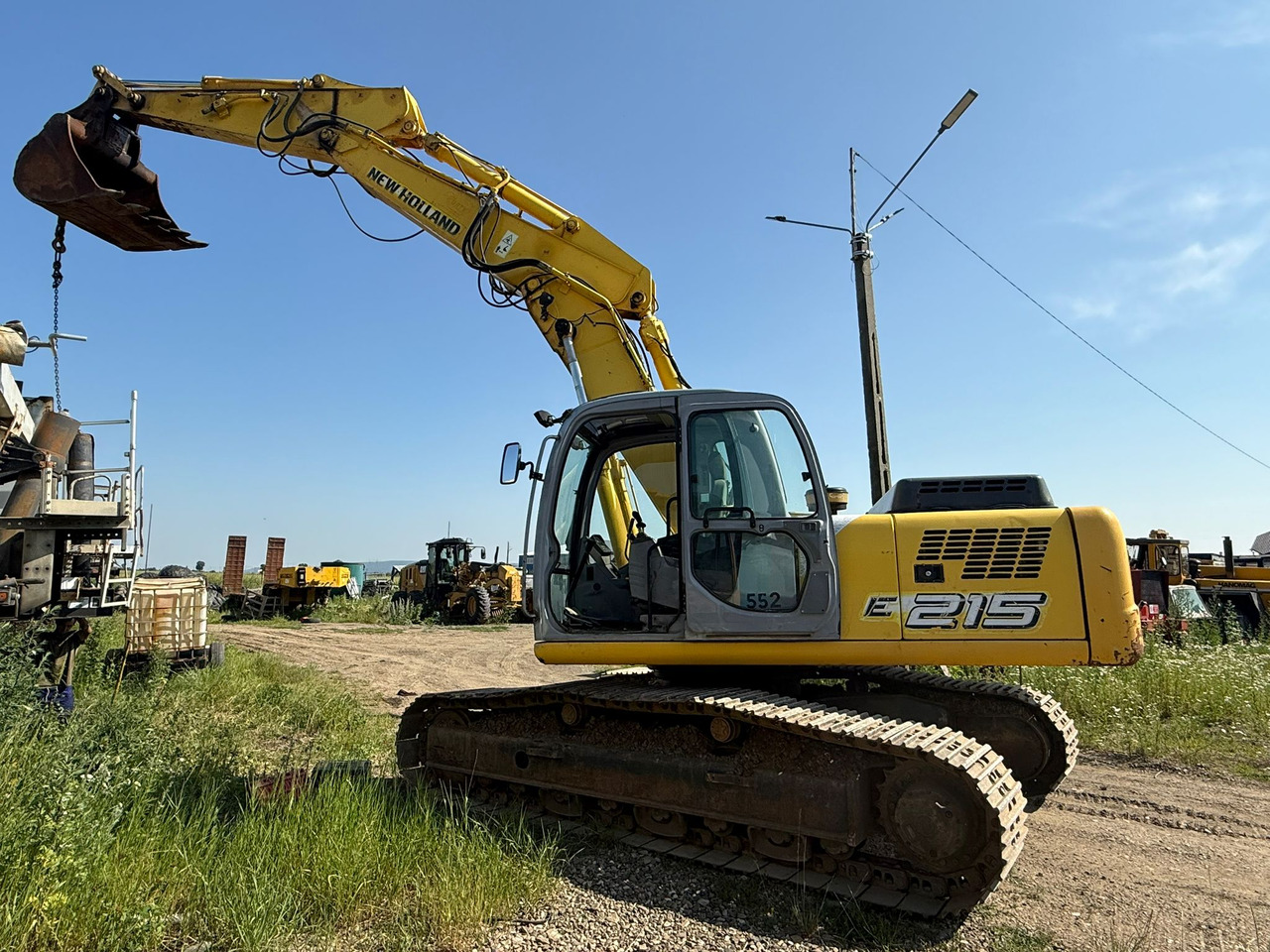 NEW HOLLAND E 215 EXCAVATOR - Ερπυστριοφόρος εκσκαφέας: φωτογραφία 2 NEW HOLLAND E 215 EXCAVATOR - Ερπυστριοφόρος εκσκαφέας: φωτογραφία 2