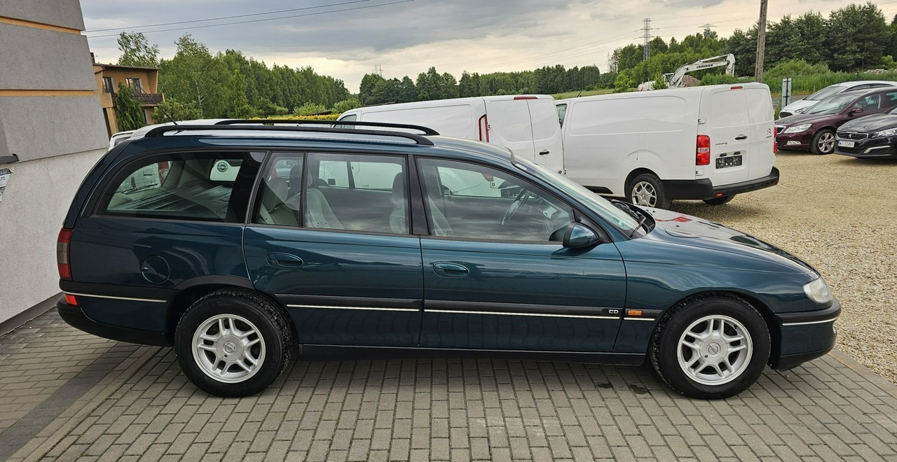 Opel Omega B 2,5 v6 *automat* napęd tył *welury* - Αυτοκίνητο: φωτογραφία 5 Opel Omega B 2,5 v6 *automat* napęd tył *welury* - Αυτοκίνητο: φωτογραφία 5