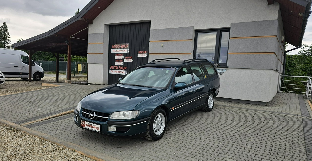 Opel Omega B 2,5 v6 *automat* napęd tył *welury* - Αυτοκίνητο: φωτογραφία 3 Opel Omega B 2,5 v6 *automat* napęd tył *welury* - Αυτοκίνητο: φωτογραφία 3
