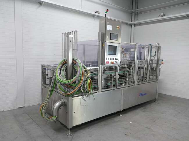 Grunwald filling- & closing machine Foodliner 12000/8 - Μηχανή τροφίμων: φωτογραφία 1 Grunwald filling- & closing machine Foodliner 12000/8 - Μηχανή τροφίμων: φωτογραφία 1