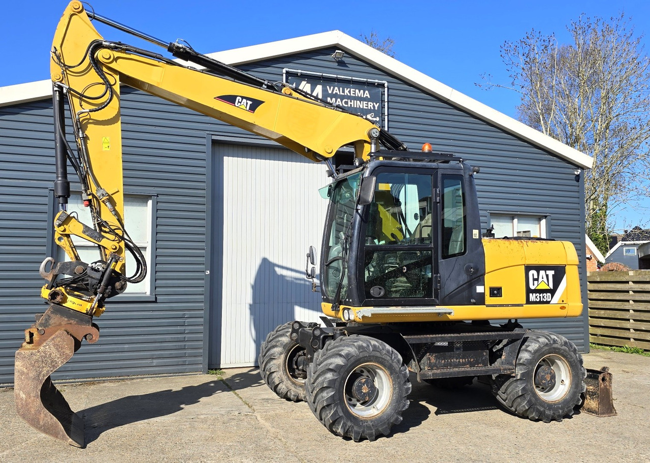 CATERPILLAR M313D - Τροχοφόρος εκσκαφέας: φωτογραφία 1 CATERPILLAR M313D - Τροχοφόρος εκσκαφέας: φωτογραφία 1